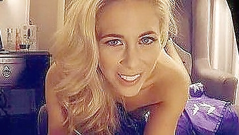 Sexy blonde girl masturbates with a dildo